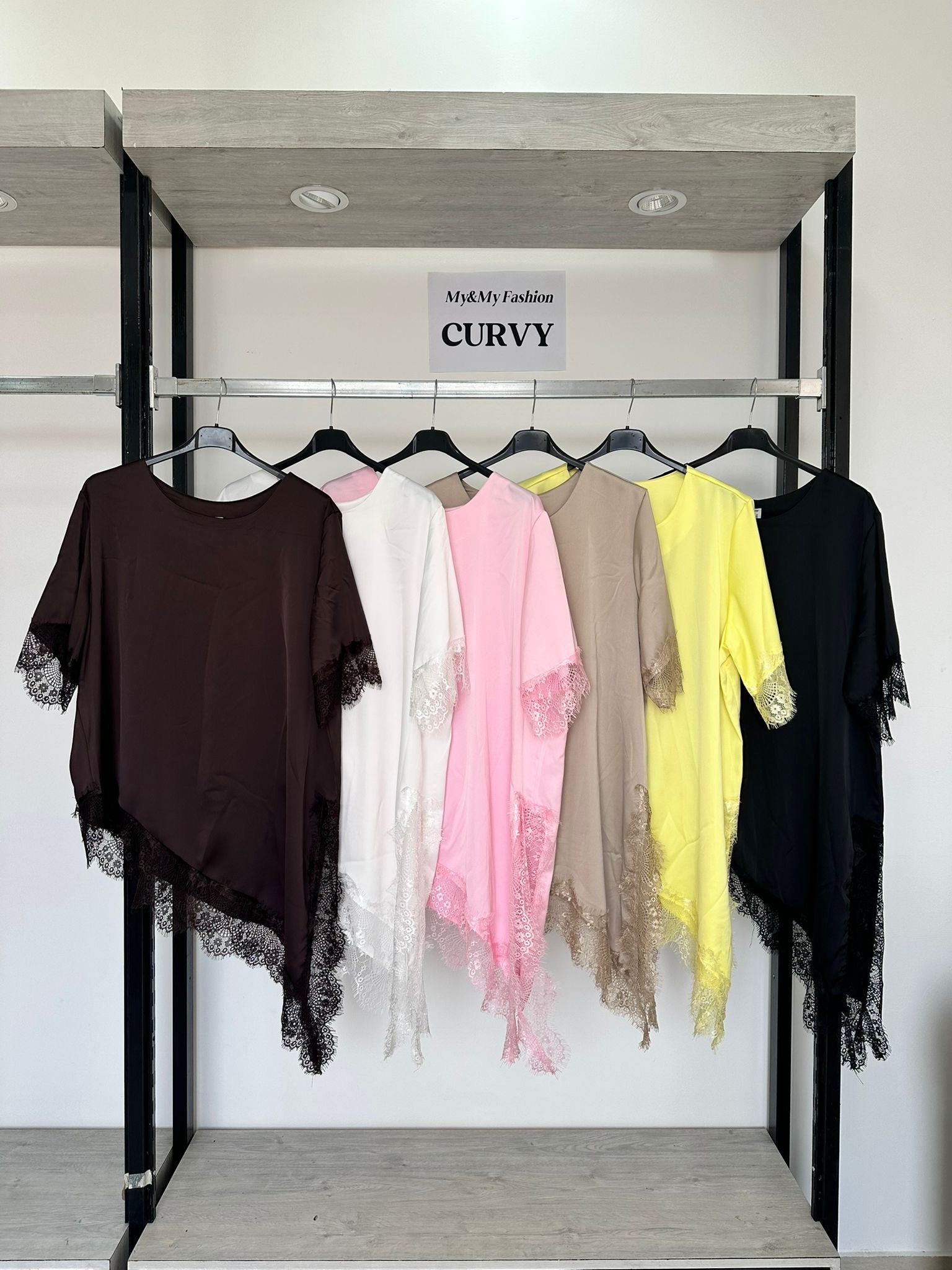 Maglia asimmetrica merletto